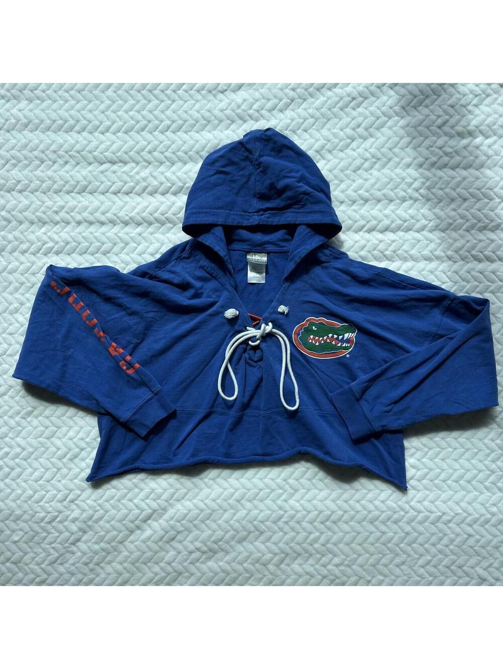 Florida Gators blue cropped hoodie with green alligator logo and orange text